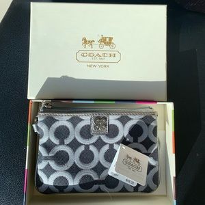 Coach Wristlet, with box. Very versatile.  Make an offer!  Generous size!